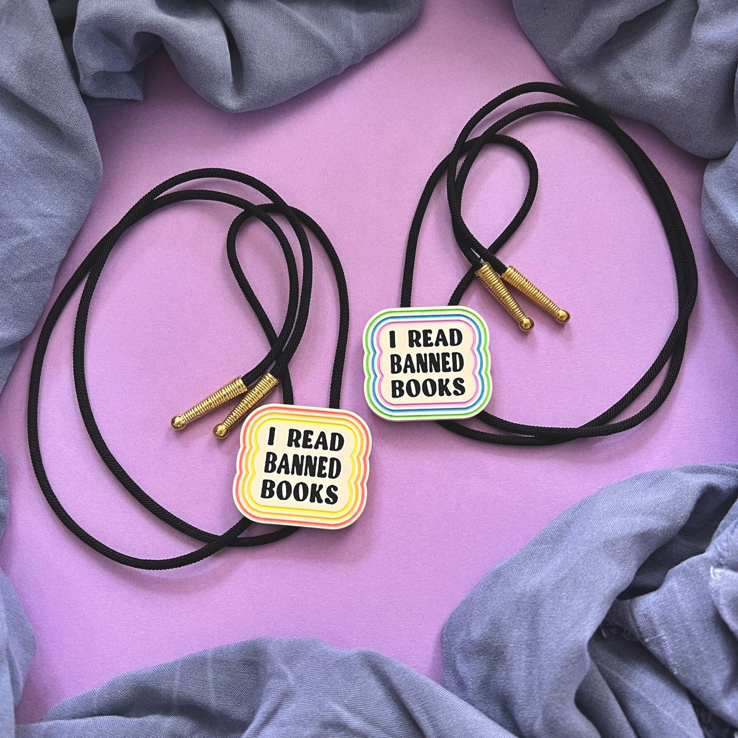 I read banned books handmade bolo tie (cool colors)