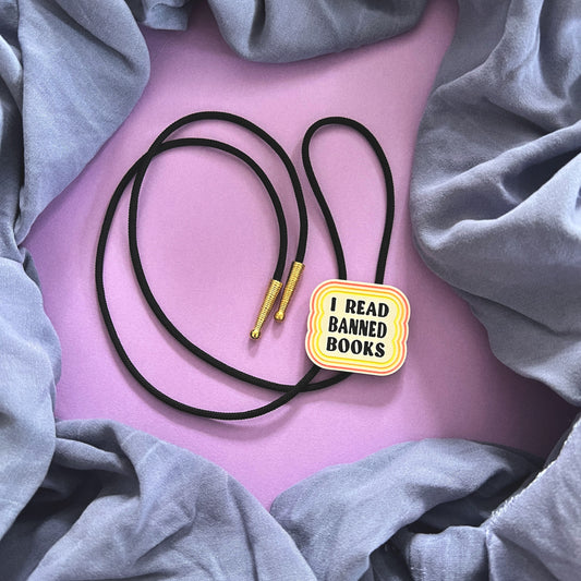 I read banned books handmade bolo tie (warm colors)