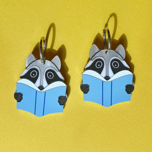 Reading raccoon earrings