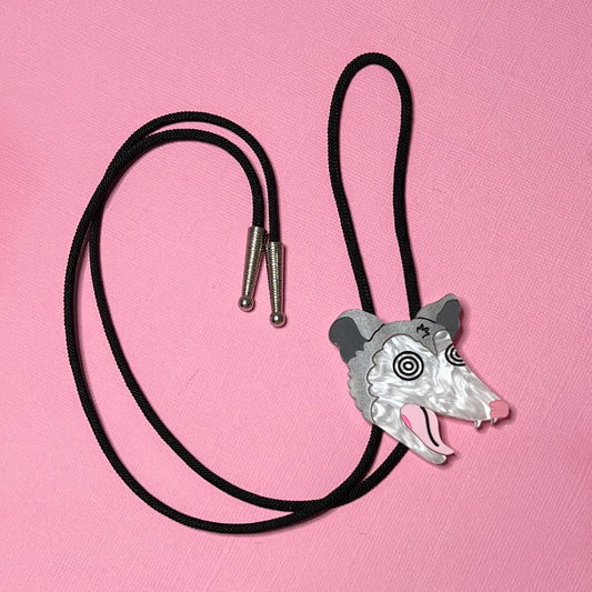 Unhinged opossum bolo tie